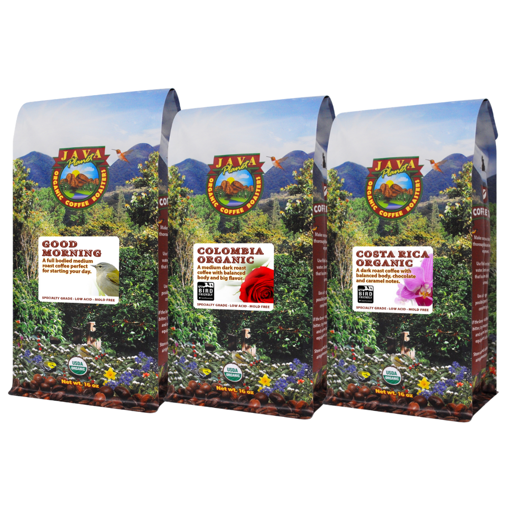 Three Java Planet coffee bags: Good Morning, Colombia Organic, and Costa Rica Organic, arranged in a row on a black backgr...